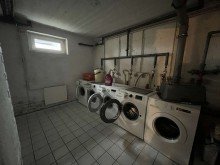 Waschmaschinenraum im Keller Gepflegte, vermietete Erdgeschosswohnung mit eigenem Garten - als Investment zu verkaufen